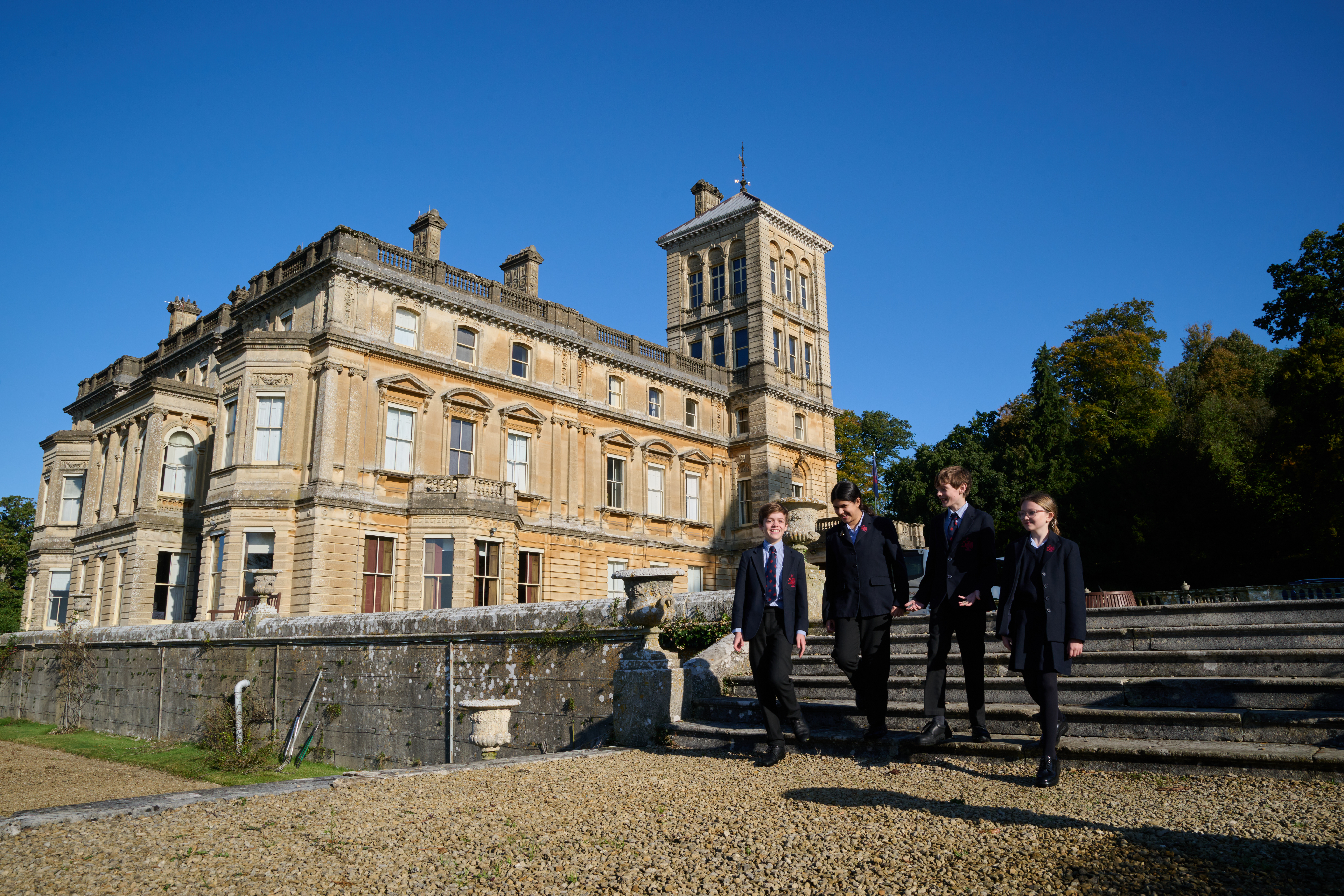 Rendcomb College headteacher with pupils