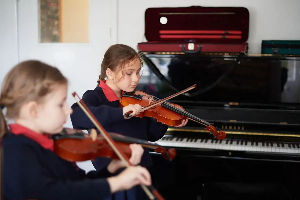 Girls playing violin
