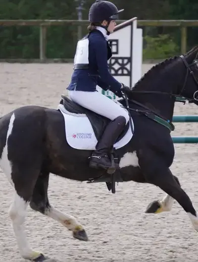 Student riding a horse